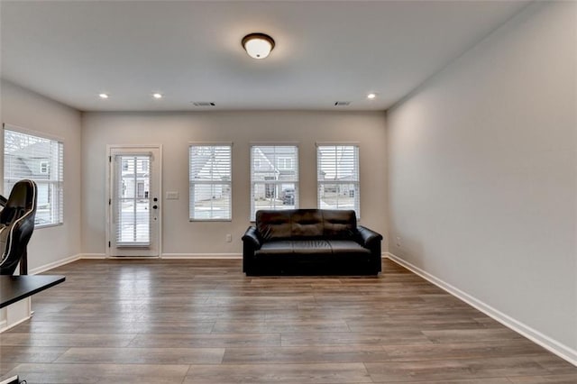 living area with wood-type flooring