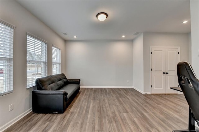 office space with light hardwood / wood-style floors