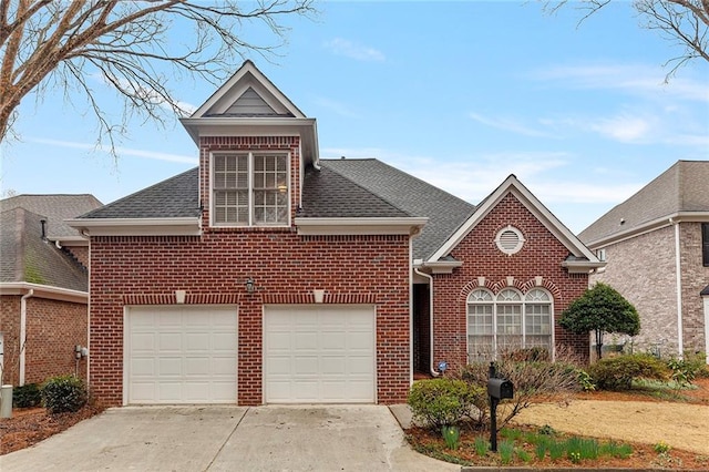 traditional home with brick siding, a garage, concrete driveway, and roof with shingles