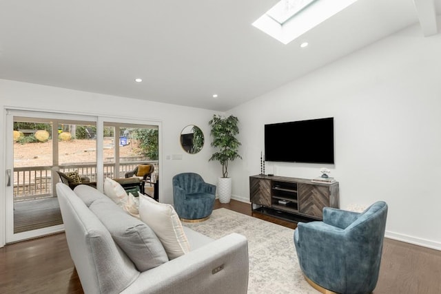 living room featuring dark wood-type flooring and lofted ceiling with skylight