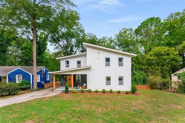 view of front facade with a porch and a front yard