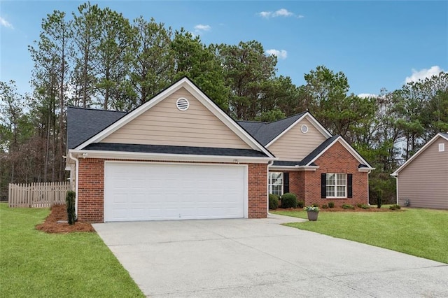 view of front facade with a garage and a front lawn