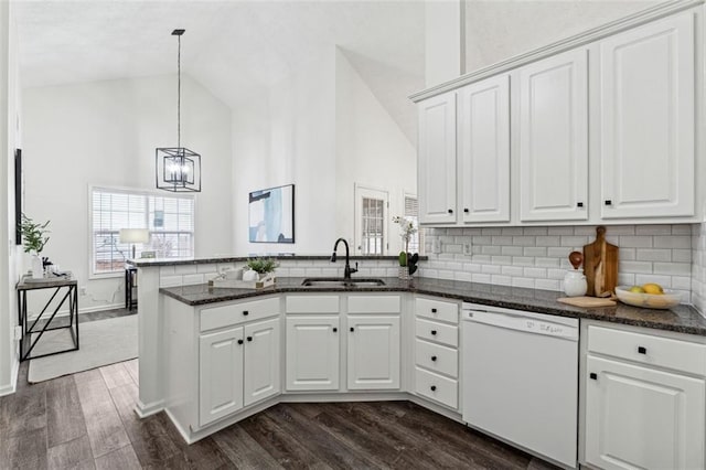 kitchen with sink, white cabinets, and dishwasher