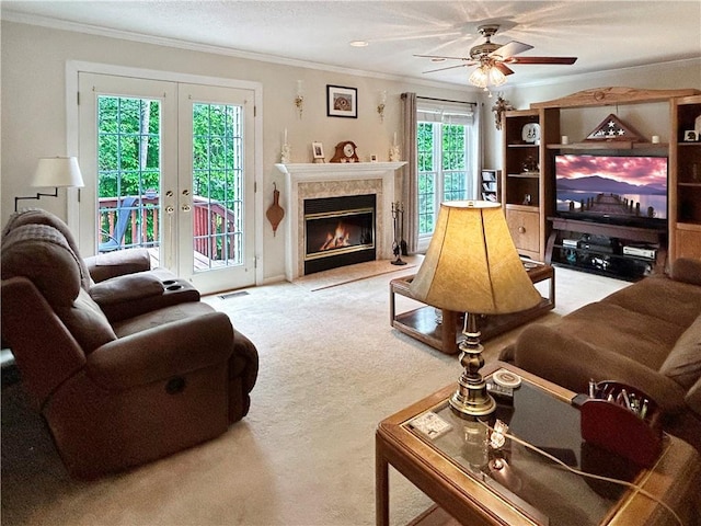 21 Picketts Ridge Ln, Acworth, GA 30101 - living room featuring carpet flooring, ornamental molding, ceiling fan, french doors, and a fireplace