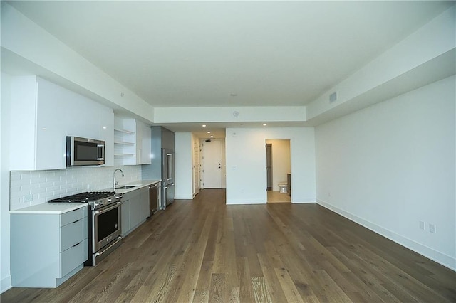 788 W Marietta St NW Unit 811, Atlanta, GA 30318 - kitchen with stainless steel appliances, a sink, open shelves, white cabinets, and light countertops