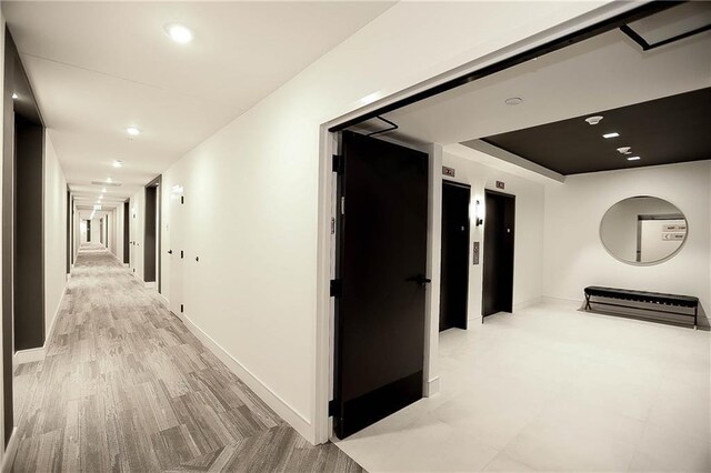 788 W Marietta St NW Unit 811, Atlanta, GA 30318 - corridor featuring baseboards, recessed lighting, and elevator