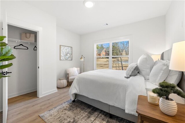 bedroom featuring light wood-type flooring