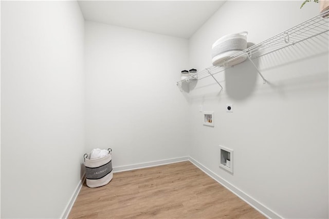 washroom featuring electric dryer hookup, wood-type flooring, and hookup for a washing machine