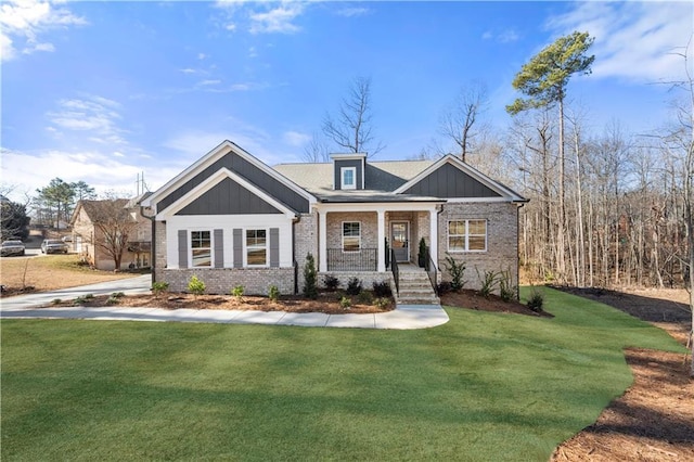 craftsman-style house with a porch and a front yard