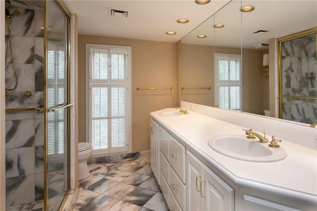 2769 Peachtree Rd NE Unit 7, Atlanta, GA 30305 - full bathroom featuring double vanity, a shower stall, and recessed lighting