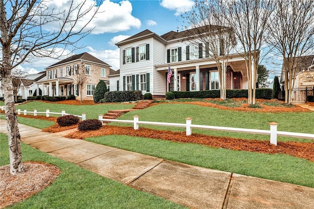 view of front of property featuring a front yard