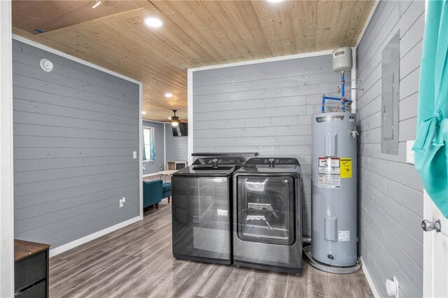 laundry area with independent washer and dryer, electric water heater, wood finished floors, wood ceiling, and laundry area