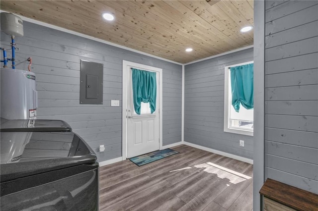 entrance foyer with wood ceiling, electric panel, water heater, recessed lighting, and wood finished floors