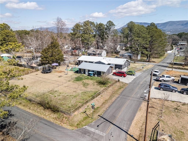 birds eye view of property featuring a mountain view