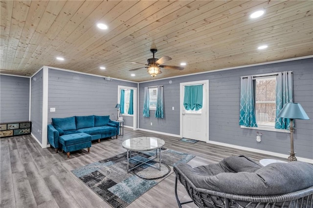 living room featuring recessed lighting, wood finished floors, and wooden ceiling