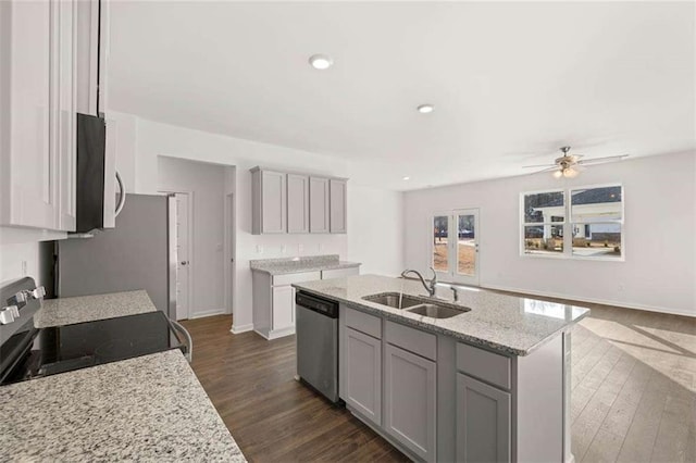 1317 Aura Ln, Lawrenceville, GA 30045 - kitchen featuring stainless steel appliances, gray cabinets, dark wood-style floors, a ceiling fan, and recessed lighting