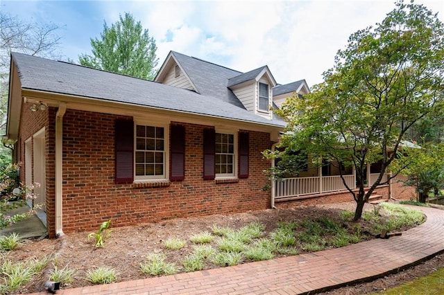 view of front of property featuring covered porch