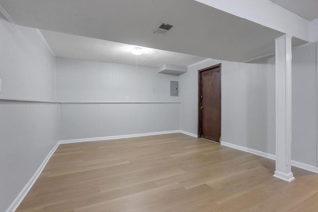 5295 Old Trail Cir, Stone Mountain, GA 30088 - finished below grade area with light wood-style floors, baseboards, and electric panel