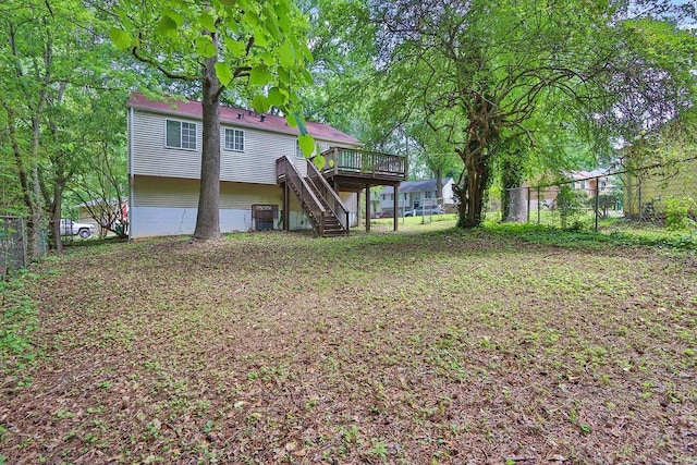 5295 Old Trail Cir, Stone Mountain, GA 30088 - rear view of house with stairs, a deck, and a fenced backyard