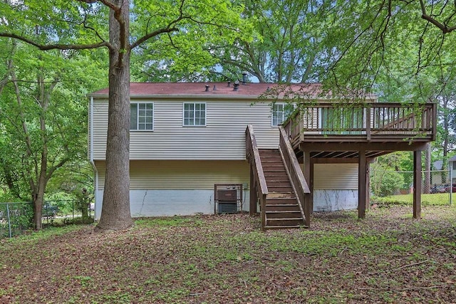 5295 Old Trail Cir, Stone Mountain, GA 30088 - back of house featuring stairs, fence, and a deck
