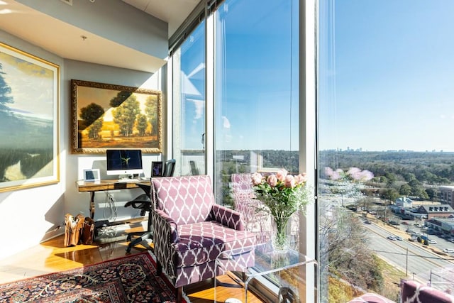 sunroom with plenty of natural light