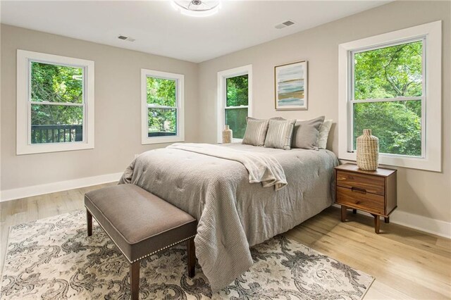 bedroom featuring light hardwood / wood-style floors