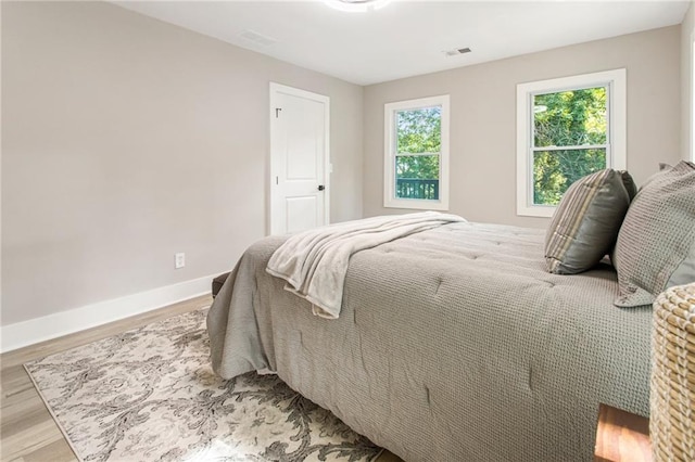 bedroom featuring light hardwood / wood-style floors