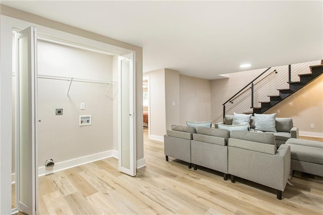 1510 Mims St SW, Atlanta, GA 30314 - living room with light wood finished floors, stairway, and baseboards
