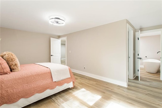 1510 Mims St SW, Atlanta, GA 30314 - bedroom featuring light wood-type flooring and baseboards
