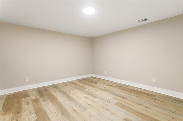 1510 Mims St SW, Atlanta, GA 30314 - empty room with light wood-type flooring, visible vents, and baseboards