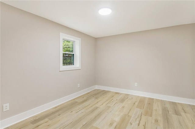 unfurnished room featuring light hardwood / wood-style flooring