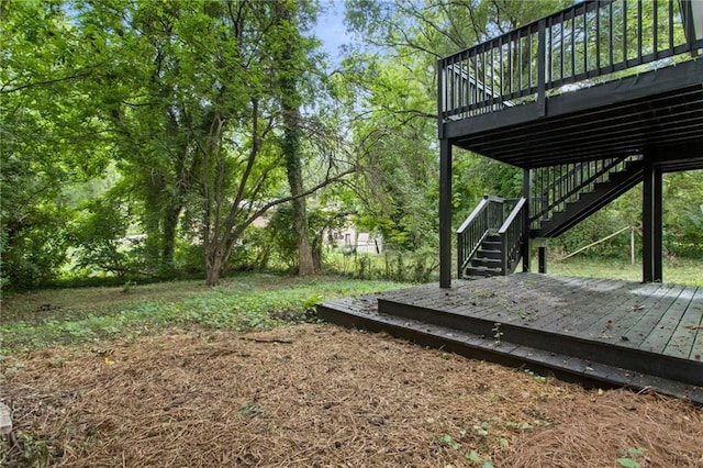 view of yard with a wooden deck