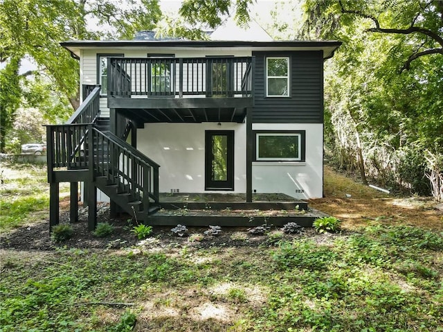 1510 Mims St SW, Atlanta, GA 30314 - rear view of property featuring stairway, stucco siding, and a deck