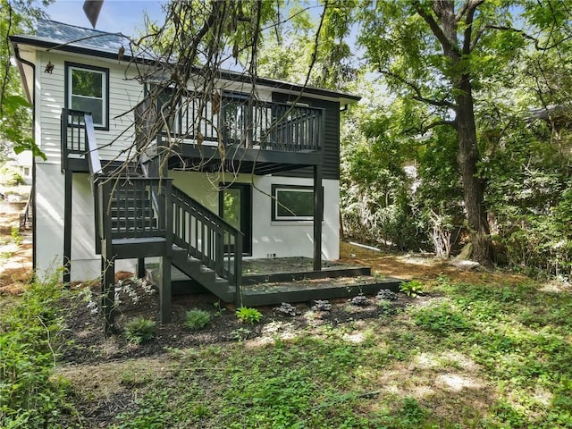 1510 Mims St SW, Atlanta, GA 30314 - back of house with stairway, stucco siding, and a wooden deck