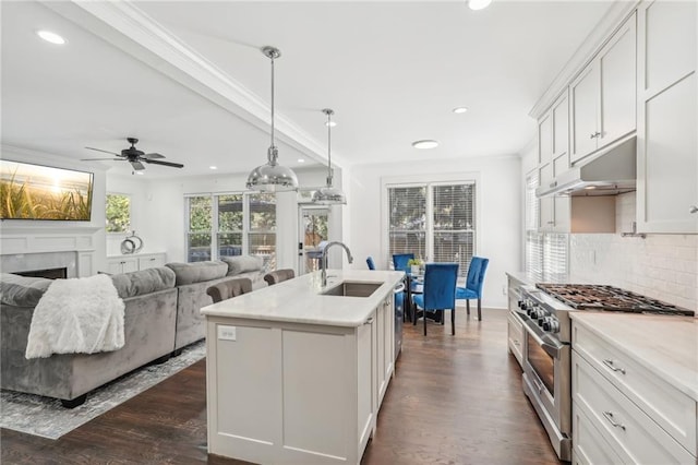 bar with wine cooler, tasteful backsplash, dark hardwood / wood-style floors, and white cabinets