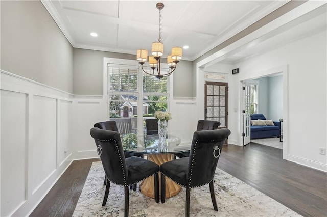 bedroom with ensuite bathroom, a raised ceiling, ceiling fan, crown molding, and dark hardwood / wood-style floors