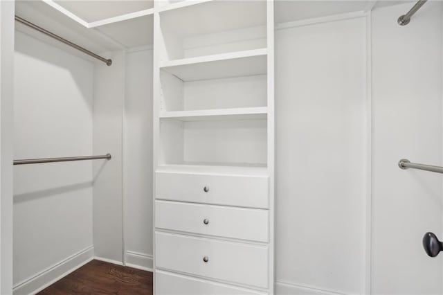 clothes washing area with independent washer and dryer and cabinets