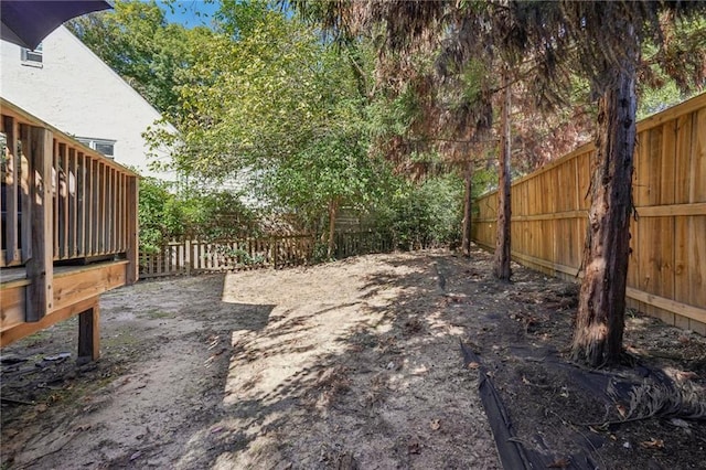 view of front of property with covered porch, a front lawn, and a garage