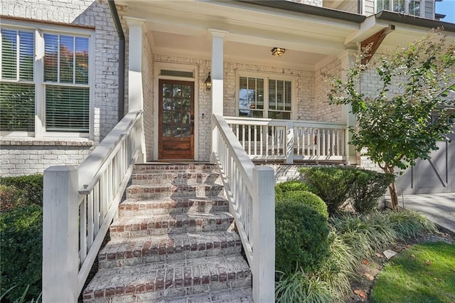 dining room featuring ornamental molding, dark hardwood / wood-style floors, and plenty of natural light