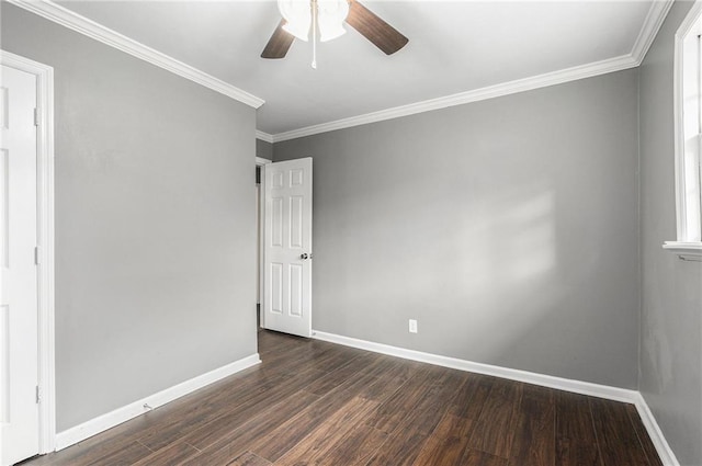 spare room featuring ceiling fan, dark hardwood / wood-style flooring, and ornamental molding