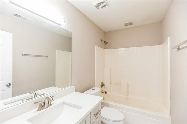 full bathroom featuring vanity, toilet, and  shower combination