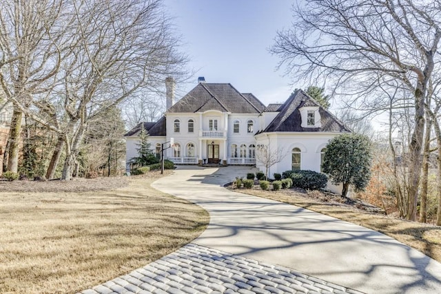 french country home with french doors