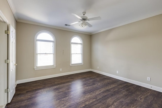 empty room with crown molding, ceiling fan, and dark hardwood / wood-style floors