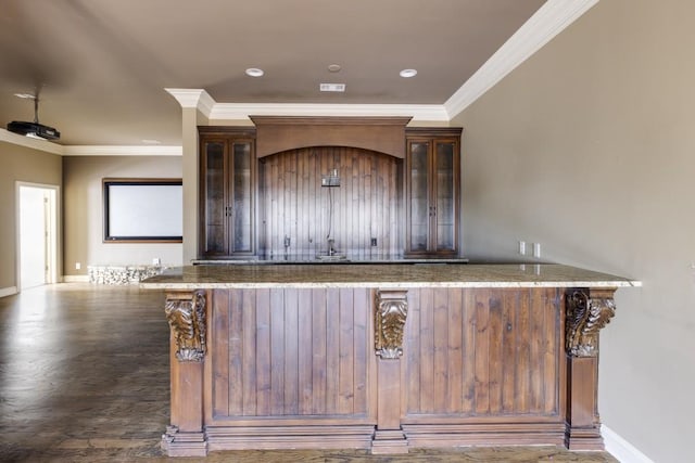 interior space featuring crown molding and dark hardwood / wood-style floors