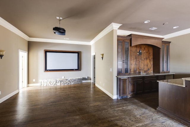 interior space featuring dark hardwood / wood-style flooring, sink, and crown molding