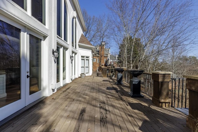 wooden terrace featuring french doors