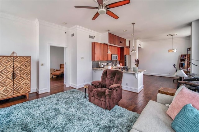 57 Forsyth St NW Unit 12B, Atlanta, GA 30303 - living area featuring a ceiling fan, dark wood-type flooring, baseboards, and ornamental molding