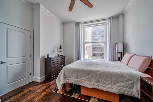57 Forsyth St NW Unit 12B, Atlanta, GA 30303 - bedroom featuring dark wood finished floors, crown molding, baseboards, and a ceiling fan
