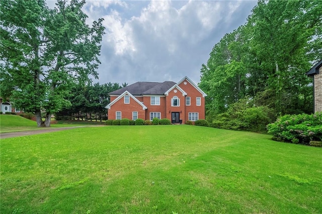 view of front of home with a front yard