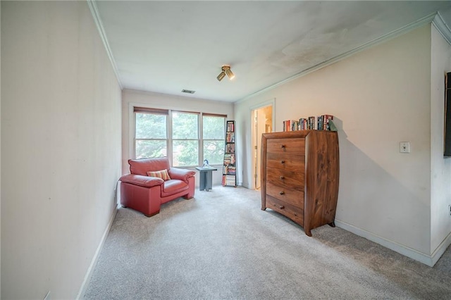 living area with baseboards, ornamental molding, visible vents, and carpet